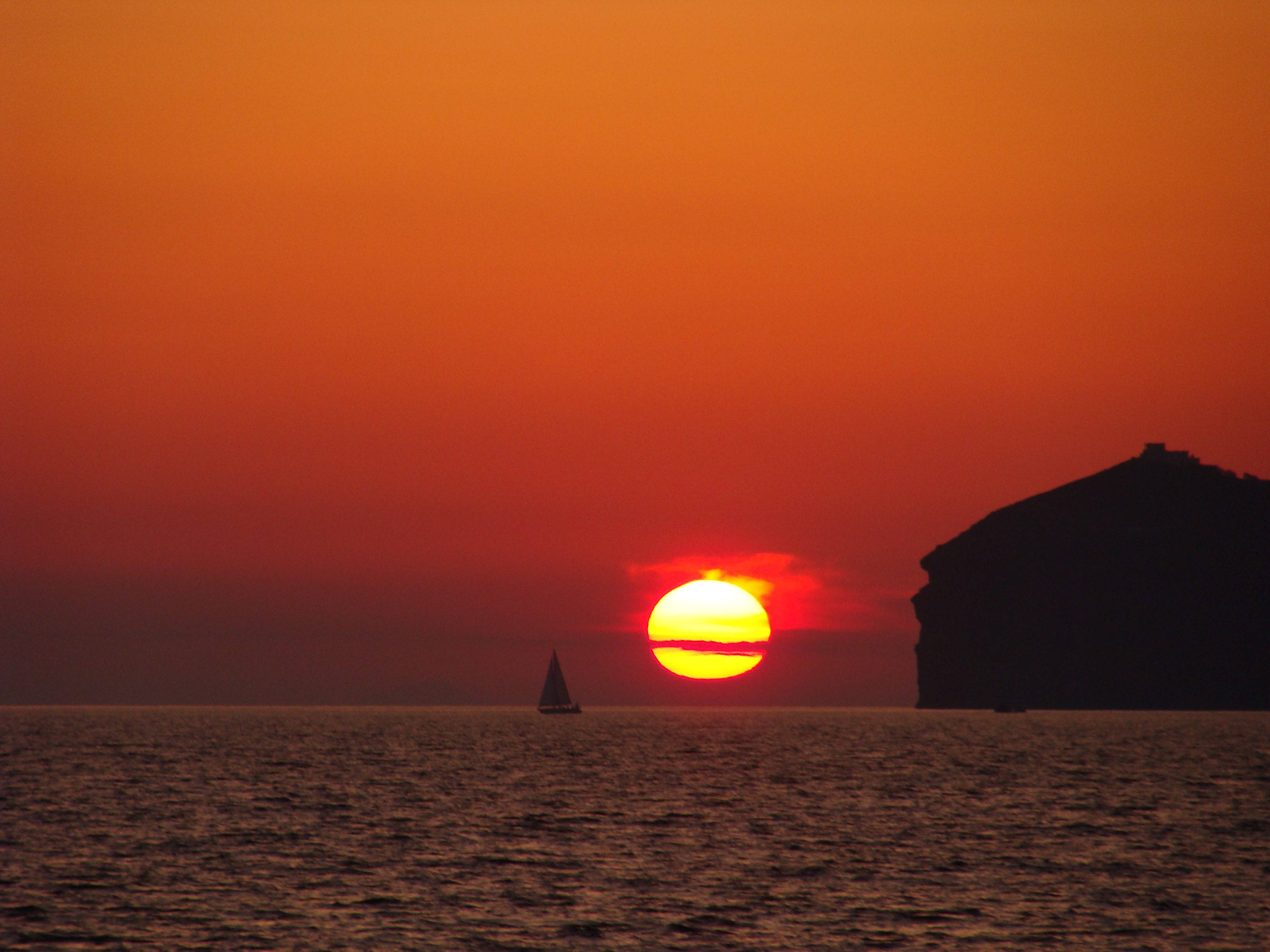 Sunset from the Spiridakos Targa Yacht in Santorini.