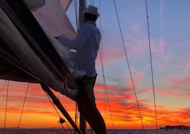 Man in front of sunset during Private Romantic Sunset Sailing Trip in Zadar The Day Sail.