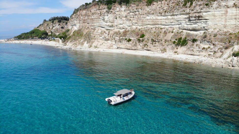 Boat from TropeaSub seen from above during the private RIB boat trip from Tropea to Capo Vaticano with snorkeling.