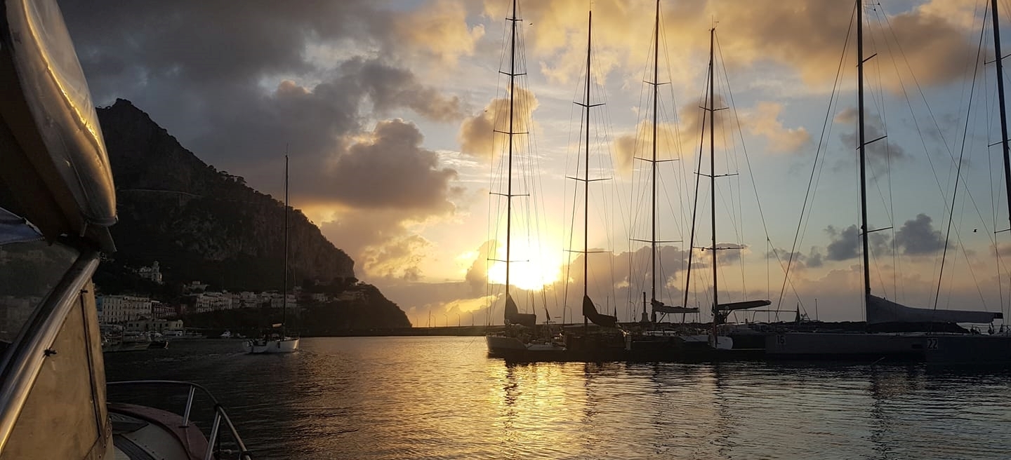 The boat is headed along the coast of Sorrento for the Private Sunset Boat Trip from Sorrento to Capri.