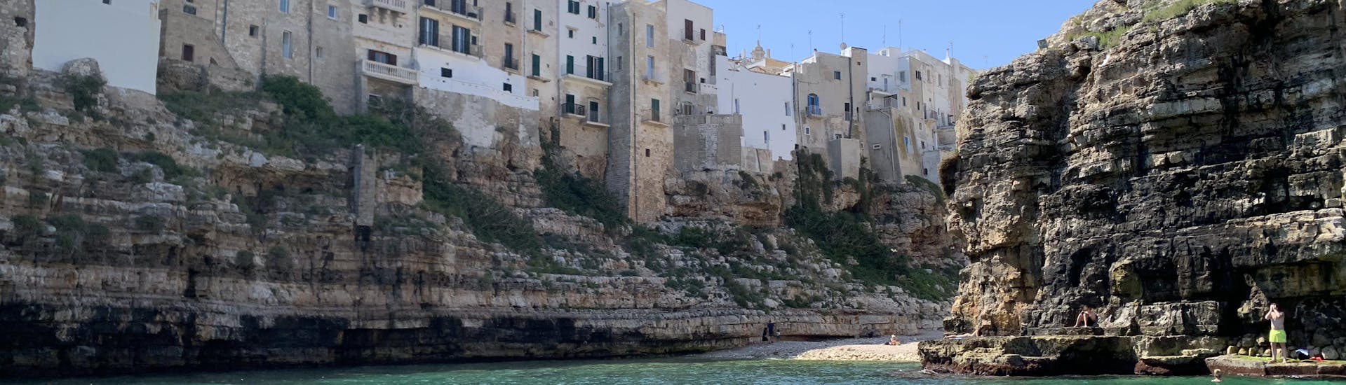 View of the cliffs of Polignano a Mare during the Sailing Boat Trip to the Polignano Caves from Monopoli with Pugliamare.