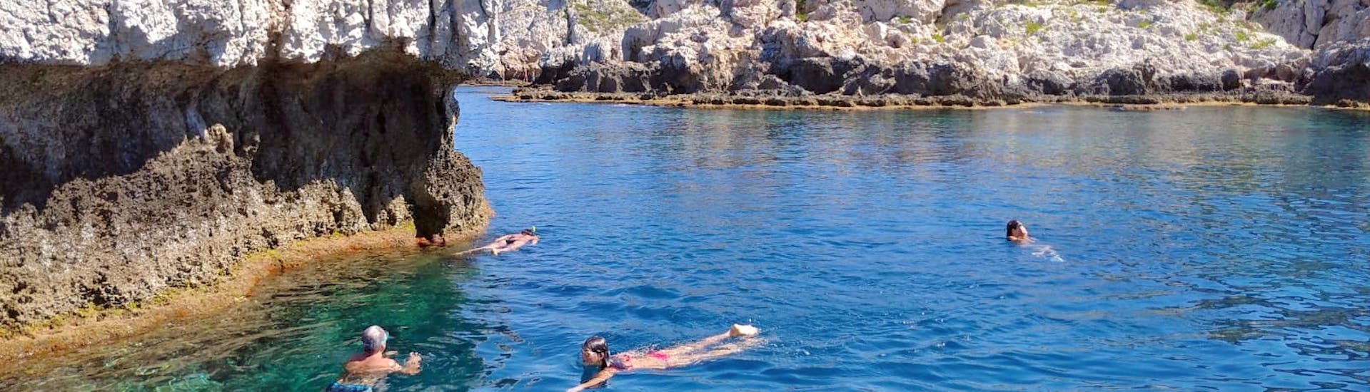 People snorkeling during Private Boat Trip to Vulcano and Lipari from Milazzo with Snorkeling with Milazzo Coast to Coast.