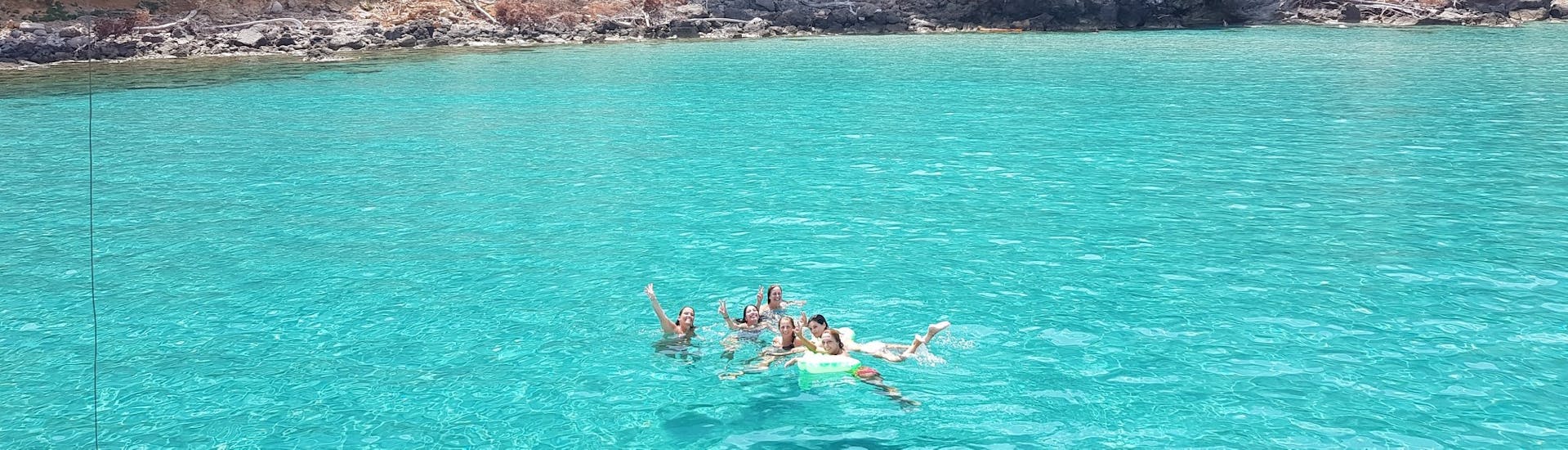 People swimming in a cave during a Boat Trip Around Mallorca's Coast with Snorkel with Royal Charters Mallorca.