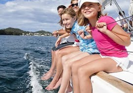 A family enjoying in a private boat trip around Mallorca's coals with snorkel with Royal Charters Mallorca.