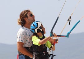 Instructor teaching a student during semi-Private Kitesurfing Lessons in Tarifa at Los Lances Beach with Radikite Tarifa.