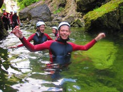 A boy walking through the water during Canyoning in Almbachklamm with Outdo Zell am See Rafting & Canyoning