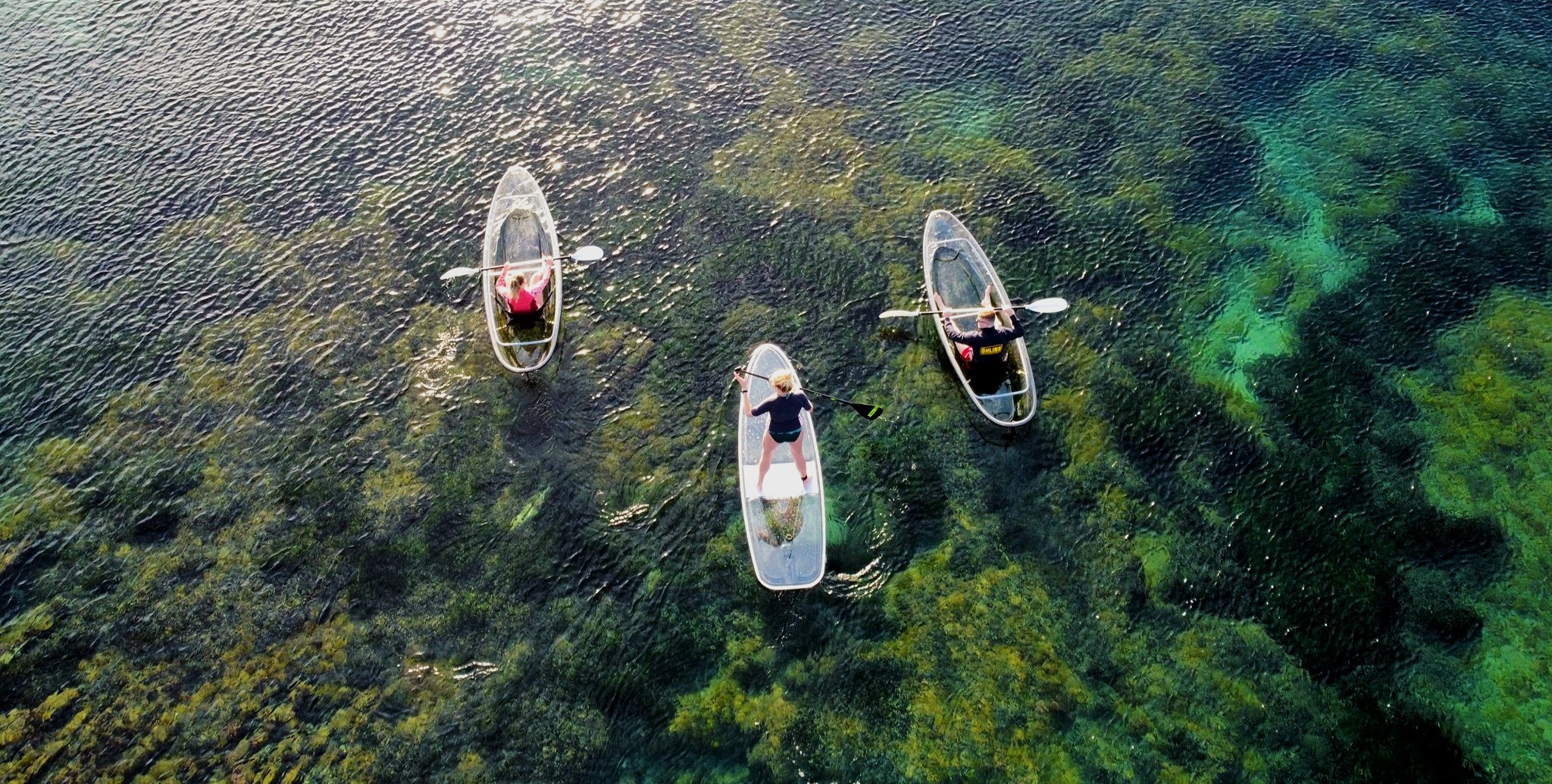 3 People are doing a Glass Bottom Sea Kayak Hire at Sunrise in Le Lavandou with Transparent'Sea in Le Lavandou