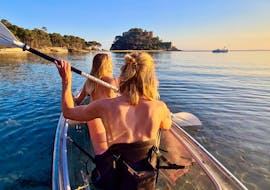 Two People are doing a Glass Bottom Sea Kayak Hire at Sunset in Le Lavandou with Transparent'Sea in Le Lavandou. 