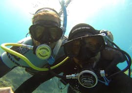 Two guys diving during a PADI Scuba Diver Course in Kallithea for Beginners with Rhodes Diving Academy.