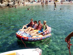 Four people on a sofa Inflatables in Corfu with Ski Club 105 Corfu.