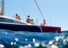 People enjoy their Catamaran Trip to the Sanguinaires Gulf with Snorkeling with Voglia di Mare. 
