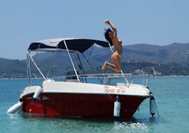 Lady jumps off the boat, rented from Abba Tours Zante.