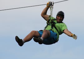 A man while Ziplining in Radovljica next to Bled with TinaRaft.