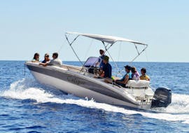 Group of people on the RIB boat while navigating at sea during the RIB rental in Arbatax for up to 8 people with Velamare Arbatax.