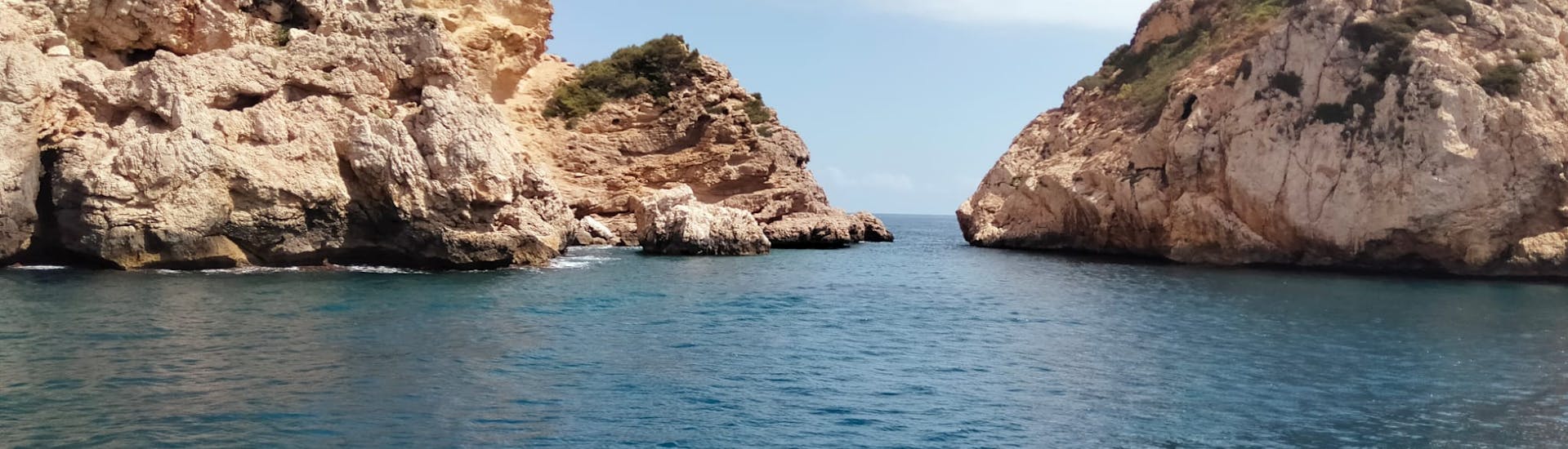 Paseo en catamarán a la Isla del Portixol con paella.