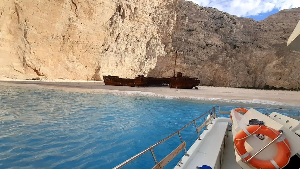 The shipwreck laying on the beach during a visit during a Private Boat Trip around Zakynthos from Agios Nikolaos with Theodosis Cruises Zakynthos.