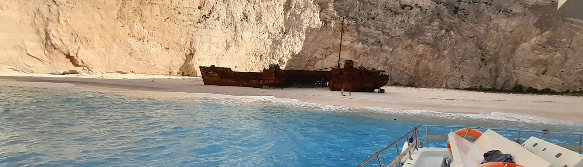 The shipwreck laying on the beach during a visit during a Private Boat Trip around Zakynthos from Agios Nikolaos with Theodosis Cruises Zakynthos.