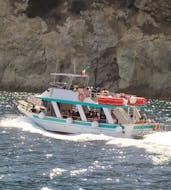 View of the boat that we'll use during our Boat Trip around Elba from Marina di Campo with Dolphin Watching with Motobarca Mickey Mouse Elba.