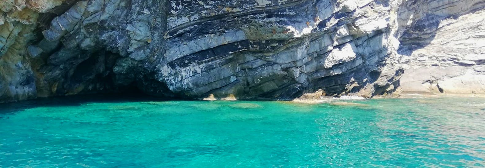 View of a cave that we'll admire during our Boat Trip around Elba from Marina di Campo with Dolphin Watching.