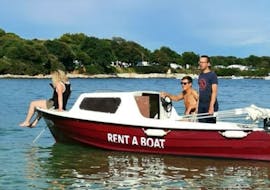 People on the Gurge 545 boat from the Boat Rental in Pula (up to 5 people) with Gurges Rent a Boat Pula.