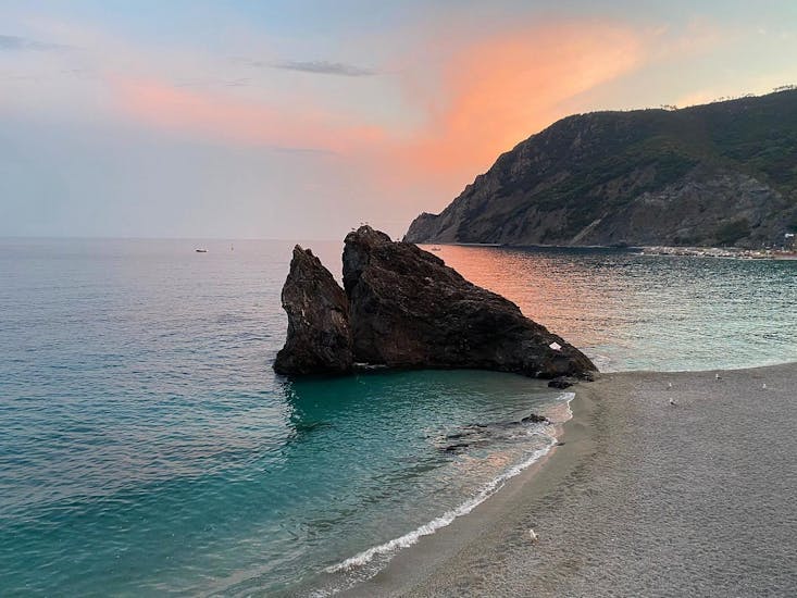 The rock of Monterosso is one of the many highlights of this Sunset Boat Trip along Cinque Terre with Aperitif with Sea Breeze Boat Tours Levanto.