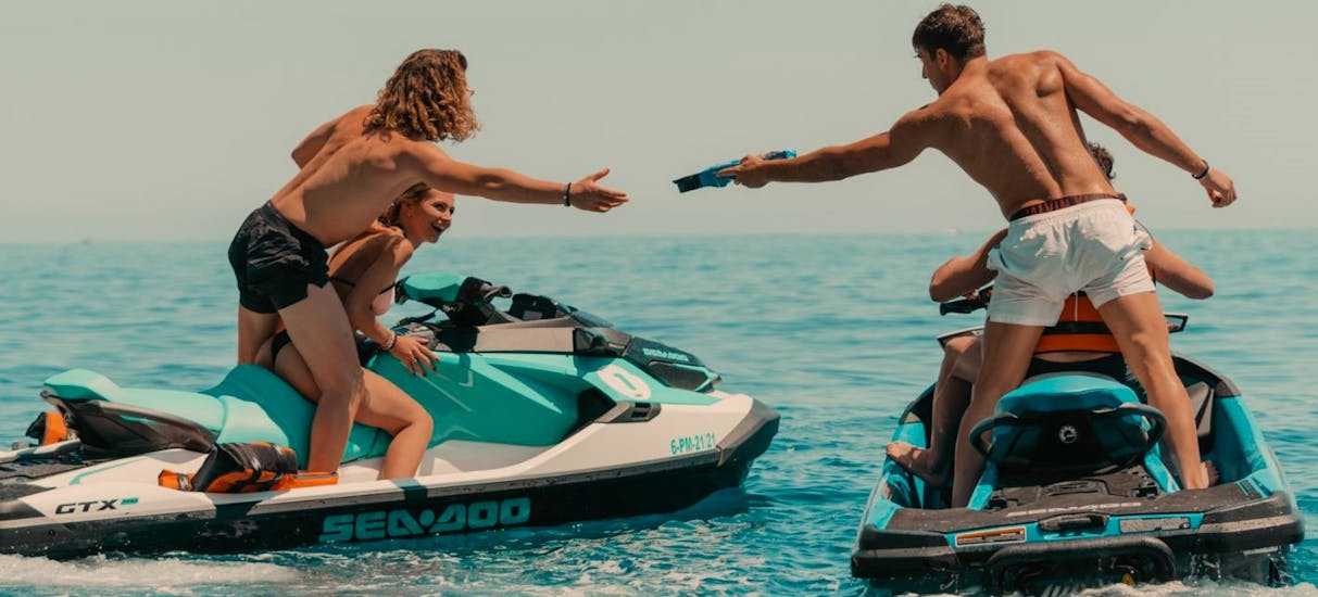 A group of friends enjoying during a Sunset Jet Ski Rental in Mallorca's Best Places with GoJet Jet Ski Mallorca.