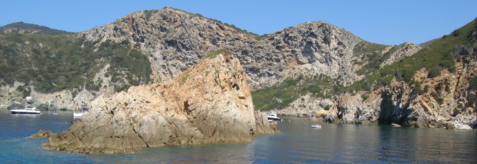 View of the coastline during our Boat trip to Giglio Island with Swimming with Toscana Mini Crociere.