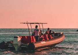 The RIB boat from HopHop Boat navigating during the Sunset Boat Trip in the Gulf of Poets with Aperitif.
