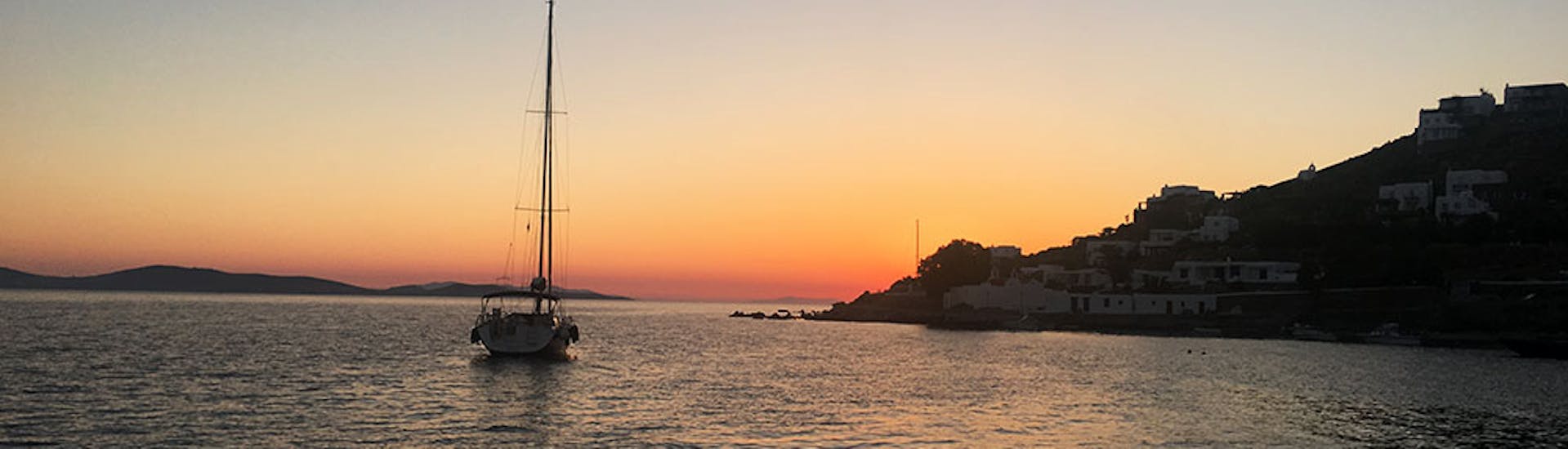 The beautiful sunset during the Sunset Boat Trip to Delos along the South Coast of Mykonos with Greece Sailing Mykonos.