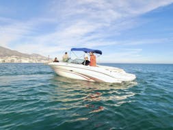A luxurious SEA RAY SELECT 200 boat with participants making a stop during a boat rental in Marbella for up to 8 people with license with Marbella Renting Boat.
