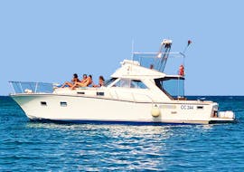 Our elegant and spacious boat La Poderosa at sea with a boat hire in Otranto for up to 8 people with Gluglù Salento.