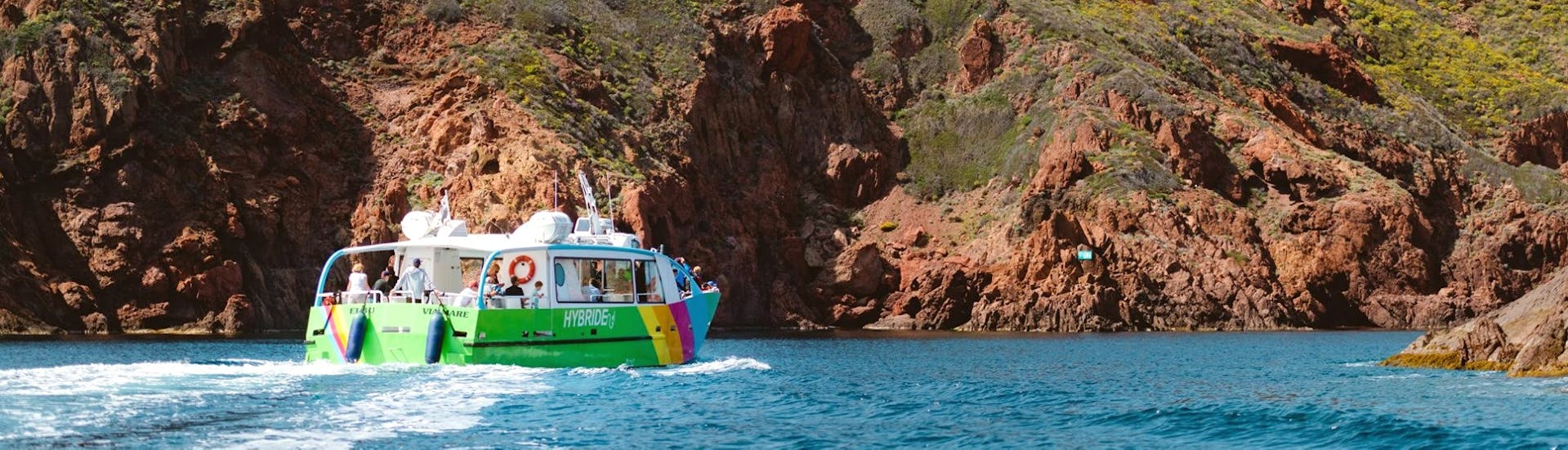 A family is doing a Boat Trip to the Calanques of Piana and Capo Rosso from Porto with Via Mare Porto.