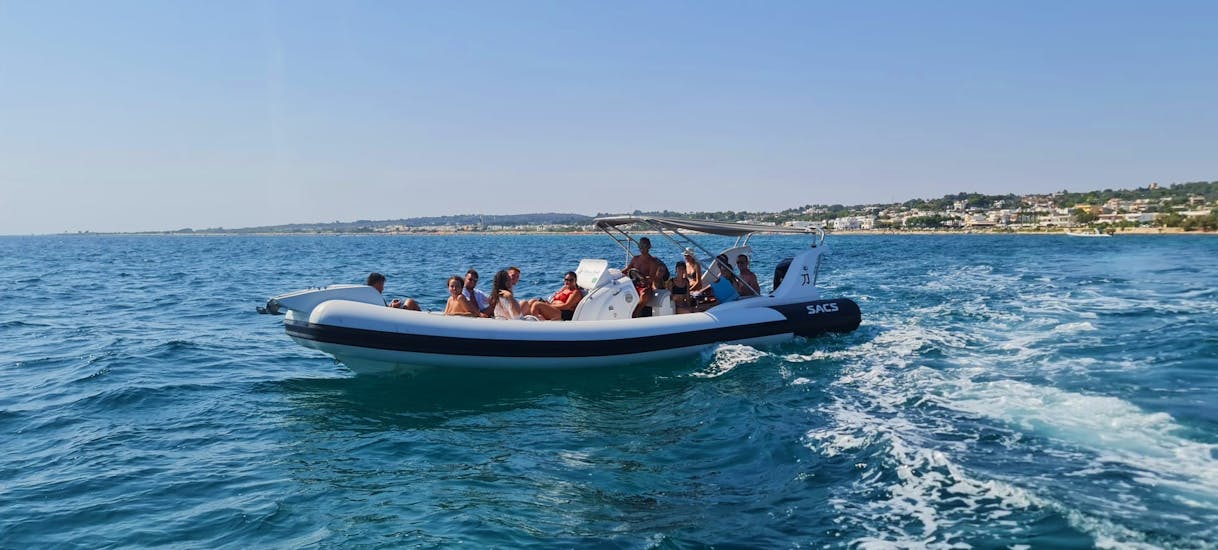 Photo of one of our comfortable boats during a RIB boat trip from Torre Vado to the Leuca caves with an aperitif with Rosa dei Venti Escursioni..