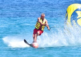 Photo of a man on a wakeboard at St. Nicholas Beach Watersports.