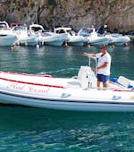 View of the boat that you'll use during our RIB Boat Rrental in Castro for 8 People with Nautica Red Coral Salento.