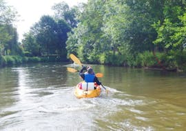 Two people paddling on the Eure during the 5km Kayak & Canoe Hire with Clue Hunt near Paris with Canoë Pour Tous.