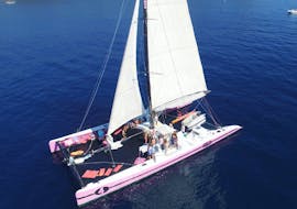 People participate to a Catamaran Trip to Cap Taillat with Aperitif with Caseneuve Maxi Catamaran.