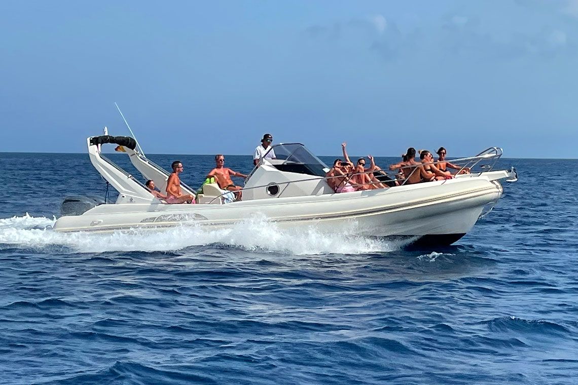 Picture of a group of people on a RIB boat from Tourist Lines Egadi during the RIB Boat Rental in Trapani (up to 12 people) with Licence.