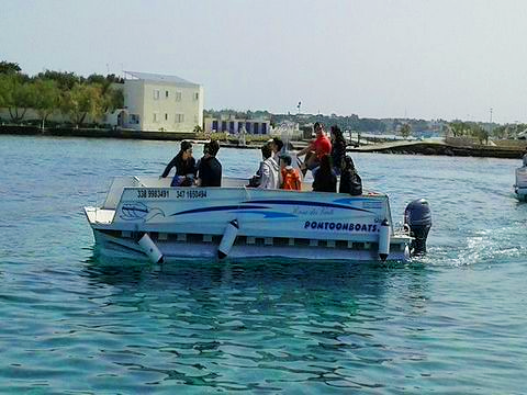 Picture of a catamaran from Pescaturismo Vivereilmare Porto Cesareo during the Private Catamaran Trip in Porto Cesareo.