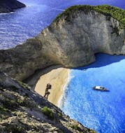 View of Navagio Beach and the shipwreck, which can be visited on the Private Boat Trip to Keri Caves and Shipwreck with Traventure Zakynthos.