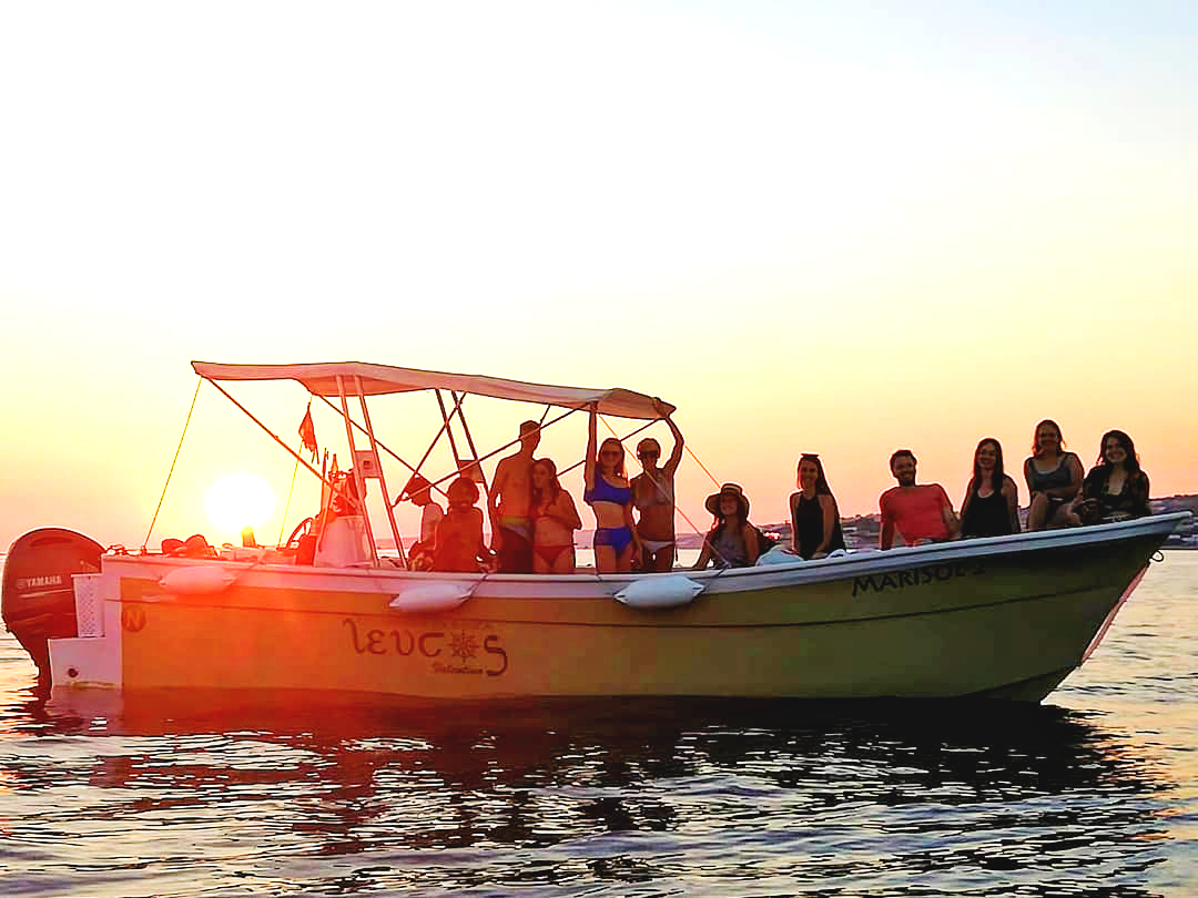 Picture of a group of people on a boat from Leucos Escursioni Leuca during the Private Boat Trip from Santa Maria di Leuca to the Sea Caves.