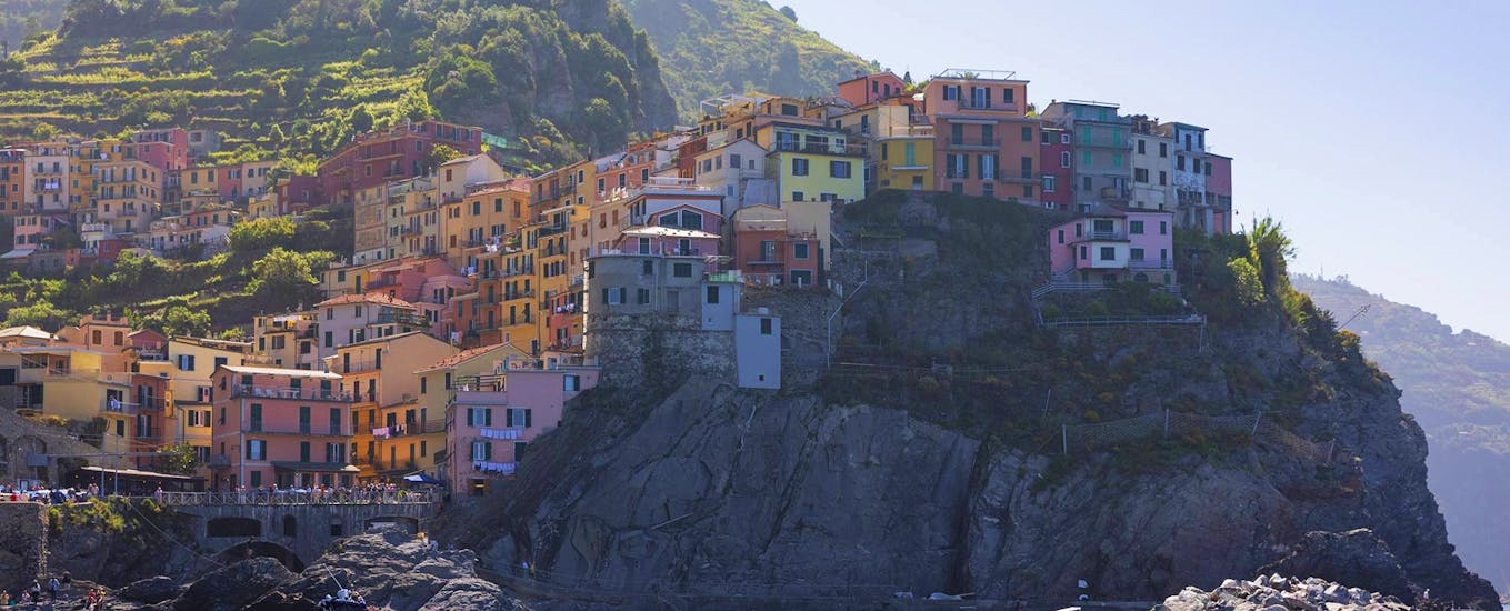 View of the Cinque Terre during a boat tour from Manarola to the Cinque Terre with an aperitif with 5 Terre Pelagos Boat Tours.