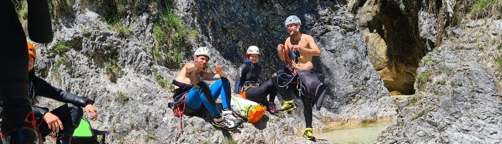 A group of participants during a break in canyoning near Salzburg - The Lone Ranger Tour with Mountain Guide Salzburg.