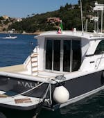 De boot Malù tijdens de privéboottocht naar het eiland Elba met lunch en snorkelen met La Favorita sul Mare Argentario.