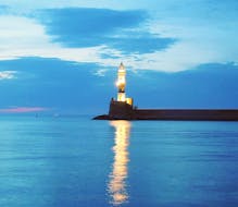 Picture of the Lighthouse of Chania during sundown.