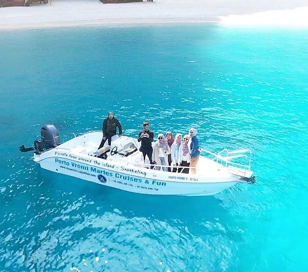 Top view of people on the boat during the Private boat trip from Porto Vromi around Zakynthos with Porto Vromi Maries.