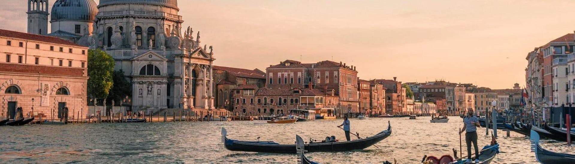 Enchanting view from the Grand Canal during a private gondola ride from St. Mark's Square along the canals of Venice with Park View Viaggi.