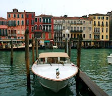 Photo of our boat anchored before a private boat ride along the Grand Canal in Venice with Park View Viaggi.