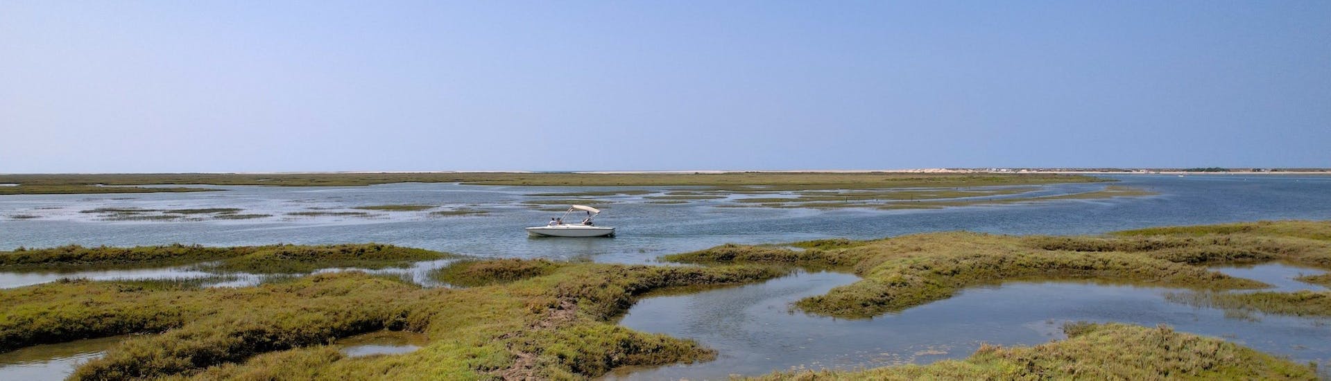 The view of the Marshes of Ria Formosa during the Boat Trip from Faro along the Marshes of Ria Formosa.
