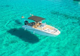 Picture of the boat from Mayer Charter Trogir on the crystal clear water during the private boat trip around the Dalmatian Islands.